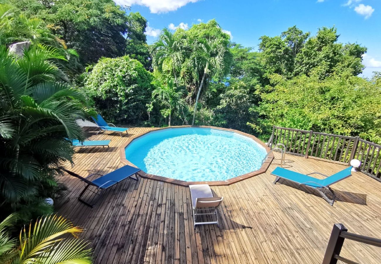 Villa in Deshaies - Villa à Deshaies G199 vue mer 11 pers piscine
